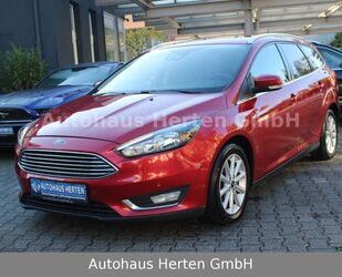 Ford Ford Focus 1.0 Turnier Titanium*NAVI*PDC*MFL*SHZ*T Gebrauchtwagen