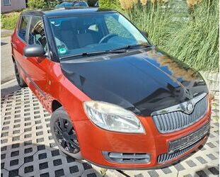 Skoda Skoda Fabia 1.2l Orange mit schwarzer Folierung Gebrauchtwagen