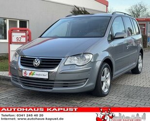 VW Touran DSG/Navi/StandH/Xenon/Park-As./7 Sitze Gebrauchtwagen